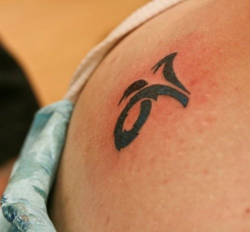 Black Tribal Capricorn Zodiac Sign Tattoo