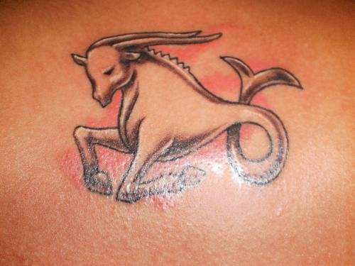 Grey Ink Capricorn Sign Tattoo