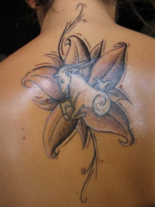 Grey Flower And Capricorn Tattoo On Upper Back