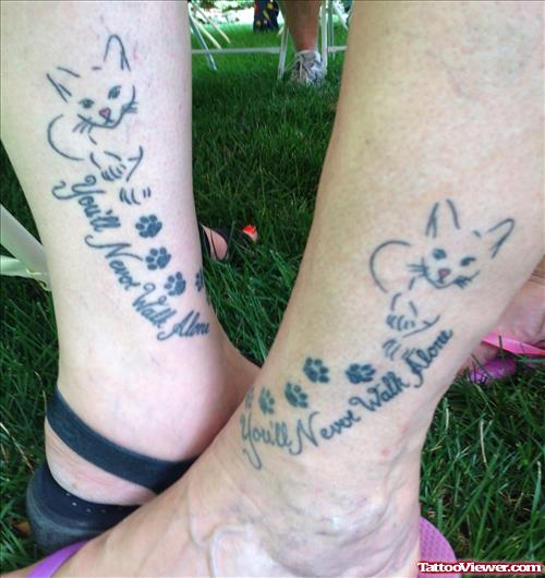 You Will Never Walk Alone Cat And Paw Prints Tatoos On Legs