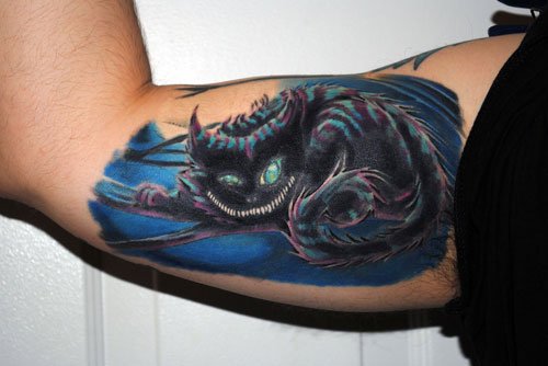 Awesome Color Ink Cat Tattoo On Inner Bicep