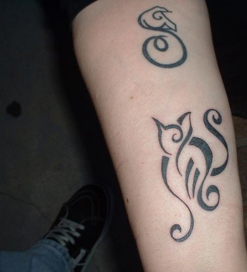 Tribal Cat Tattoos On Arm