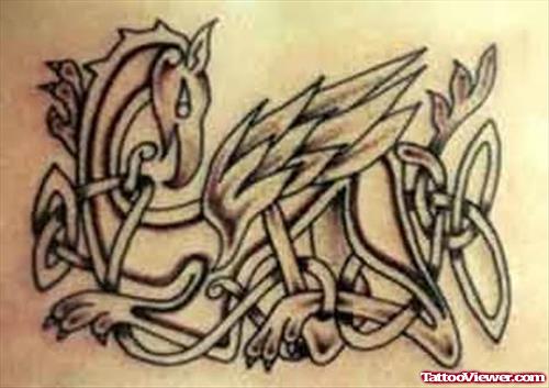 Elegant Celtic Bird Tattoo