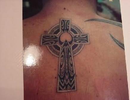 Elegant Celtic Cross Tattoo On back