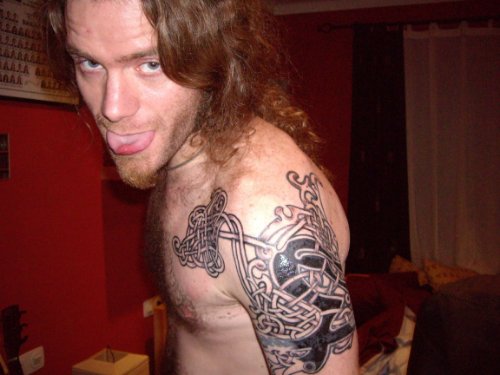 Guy With Celtic Tattoos On Body