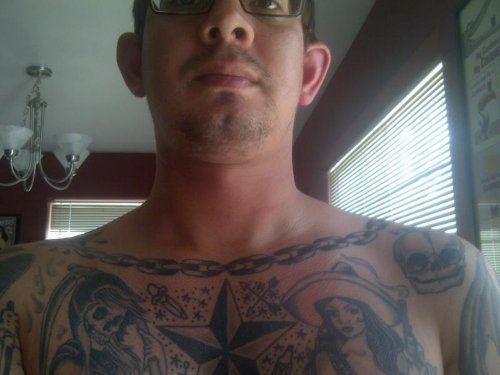 Black Ink Chain Tattoo On Chest
