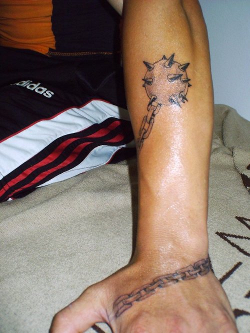 Grey Ink Chain Tattoo On Man Left Sleeve