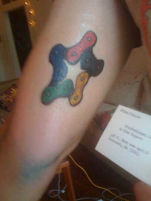 Colored Chain Tattoo On Leg