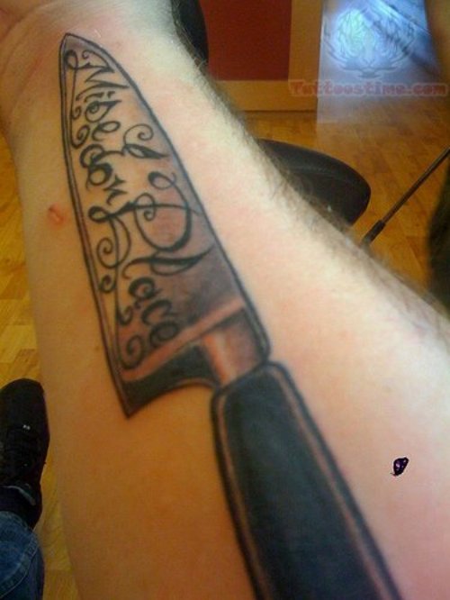 Large Chef Knife Tattoo On Arm