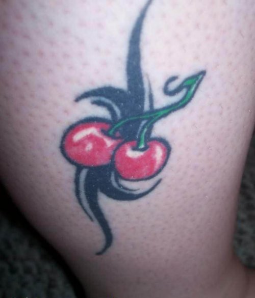 Tribal Cherry Tattoo On Leg