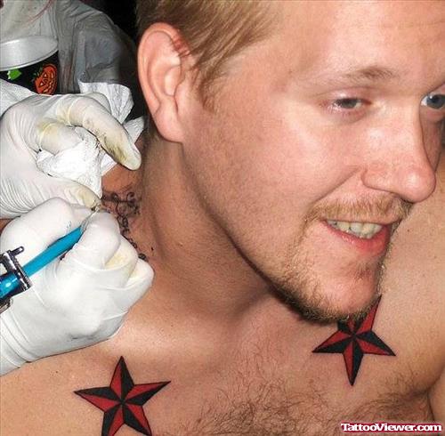 Red Nautical Stars Chest Tattoo