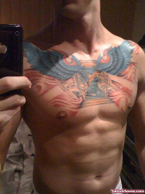 Blue Ink Large Wings Bird Chest Tattoo