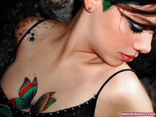 Colored Butterfly Chest Tattoo For Girls