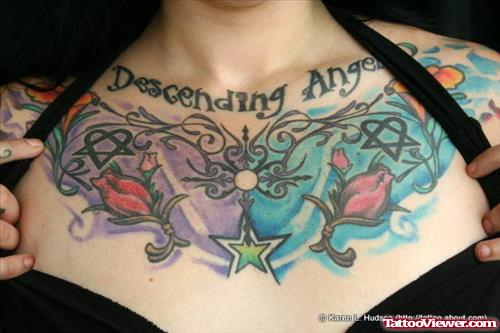 Colored Rose Flowers And Stars Chest Tattoo