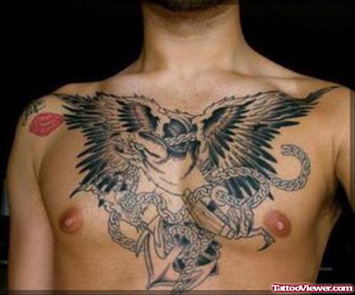 Anchor And Wings Chest Tattoo