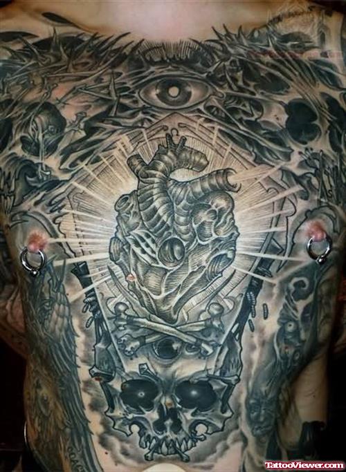 Grey Ink Heart And Skull Tattoo On Chest