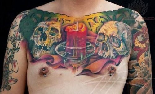 Skulls And Candle Tattoo On Chest