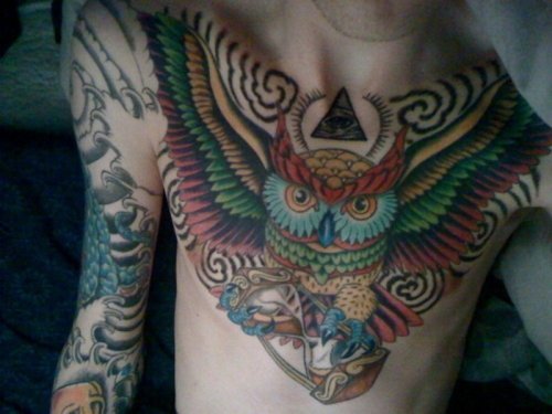 Amazing Colored Owl Chest Tattoo For Men