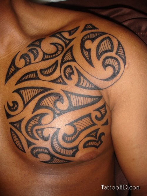 Polynesian Black Ink Tribal Chest Tattoo