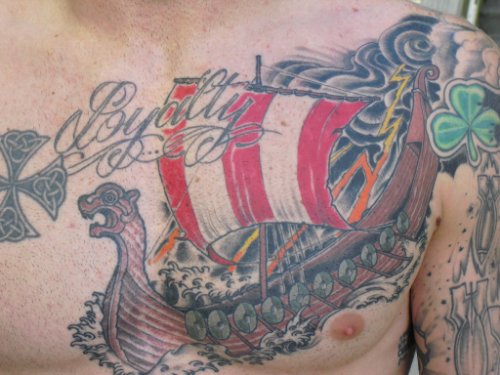 Celtic Crross And Colored Ship Chest Tattoo