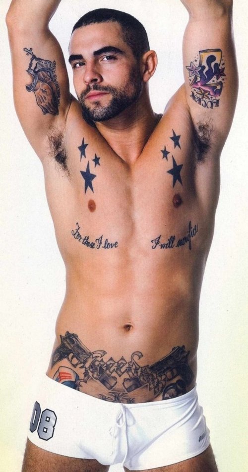Man With Stars Chest Tattoo