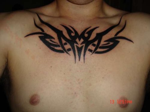 Classic Black Ink Tribal Chest Tattoo For Men