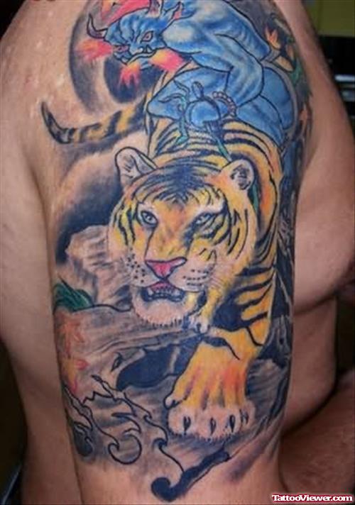 Chinese Tiger Tattoo Design On Muscle