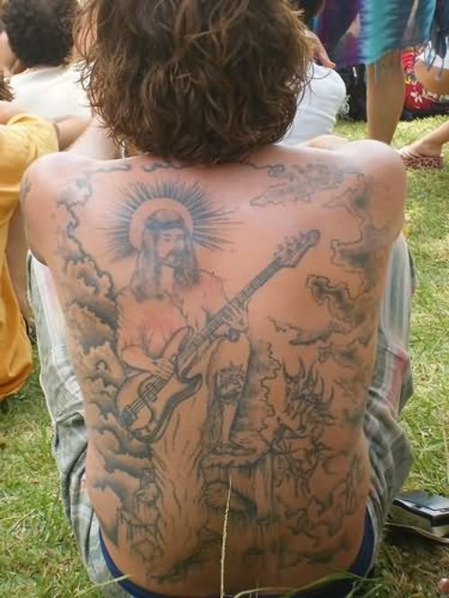 Jesus Playing Guitar Tattoo On Back