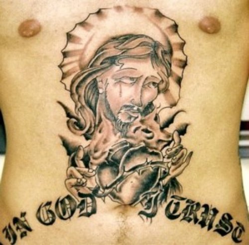 Grey Ink Jesus Head Christian Tattoo On Belly
