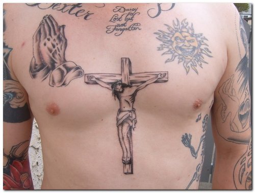 Praying Hands And Christianity Tattoo On Man Chest