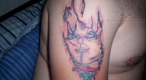 Chucky Head Tattoo On Half Sleeve