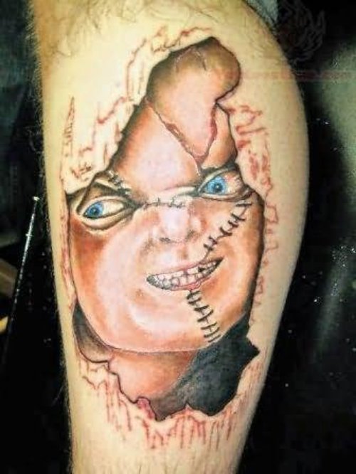 Ripped Skin Chucky Tattoo On Leg