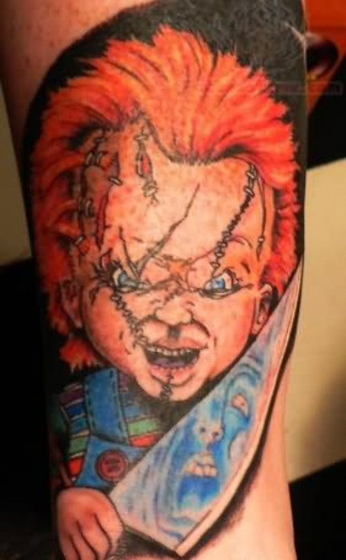 Arm Color Chucky With Knife Tattoo