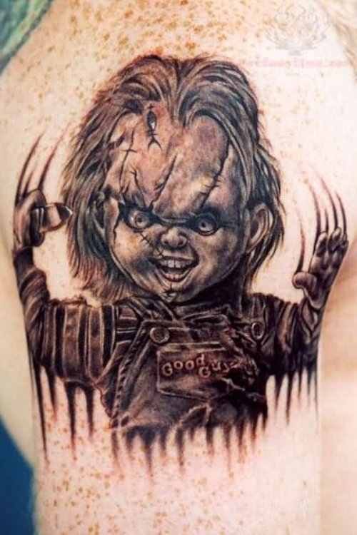 Black Ink Chucky Tattoo On Shoulder