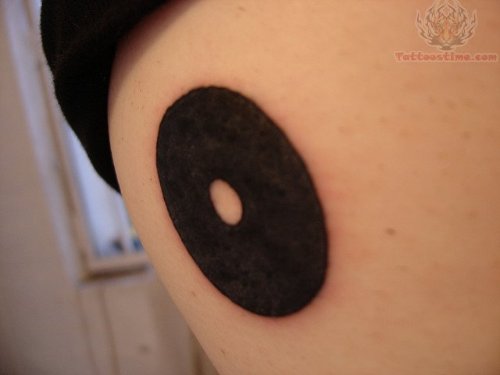 Black Ink Fill In Circle Tattoo