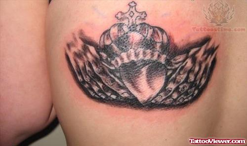 Claddagh And Cross Tattoo On Back
