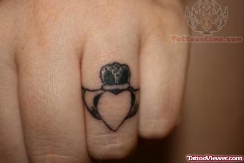 Claddagh Ring Tattoo On Finger