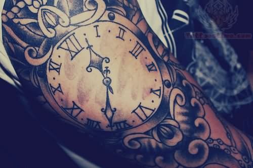 Clock Tattoo On Right Sleeve