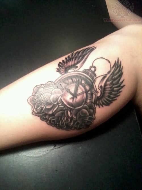 Winged Clock Tattoo and Flowers Tattoo On Leg
