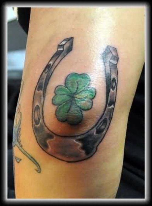 Grey Ink Horse Shoe And Clover Tattoo