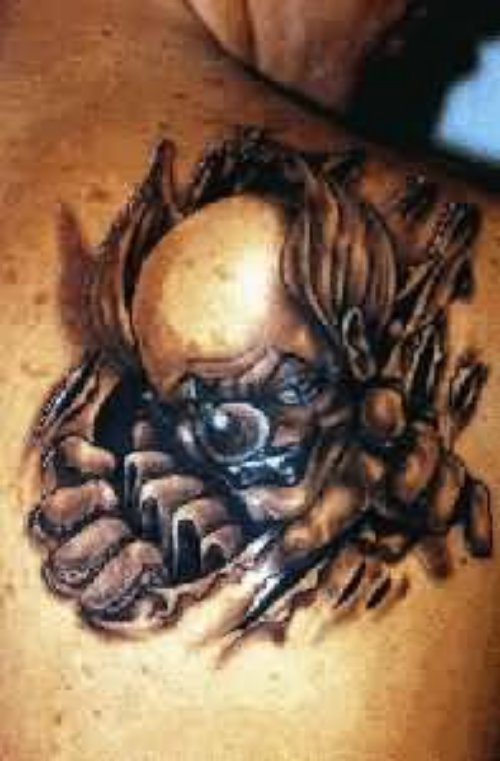 Skull Wings Clown Tattoo