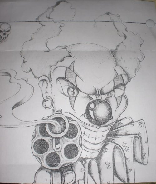 Evil Clown Gun Tattoo Design
