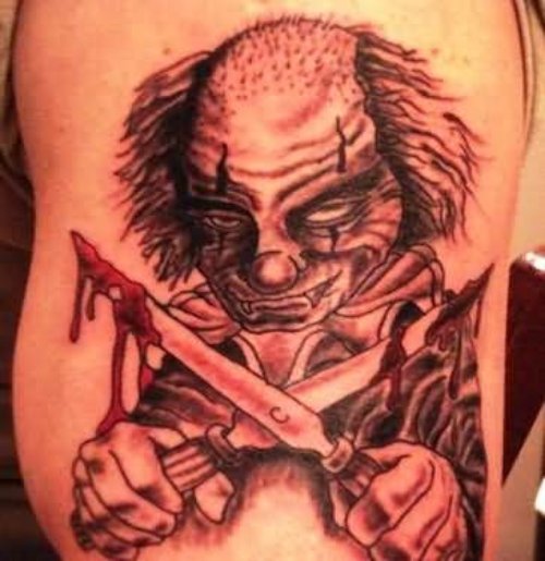 Killer Clown Tattoo On Muscles