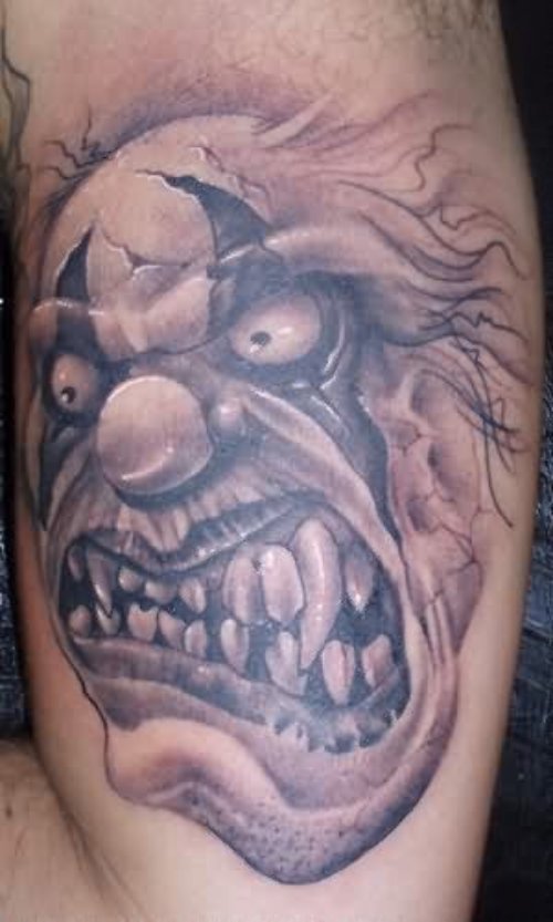 Angry Clown Face Tattoo On Arm