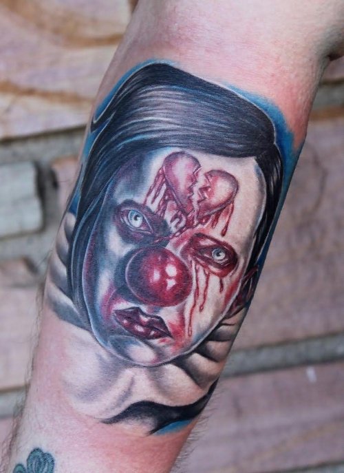 Creepy Clown Tattoo On Arm Sleeve