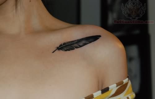 Awesome Feather Collarbone Tattoo