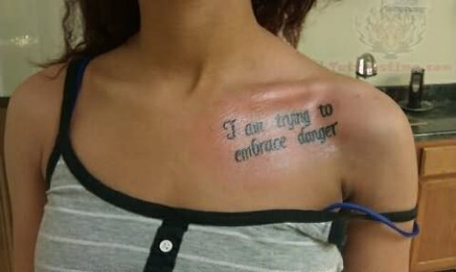 I Am trying To Embrace Danger Tattoo On Collarbone