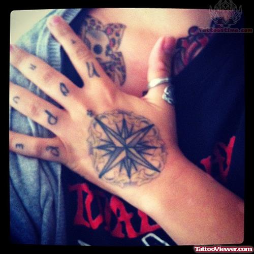 Back Hand Compass Tattoo