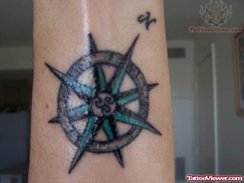Blue And Black Ink Compass Tattoo