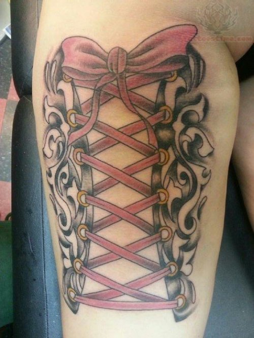 Nice Corset Bow Tattoo On Leg